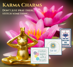 A shiny brass frog sits in a yoga pose in front of two pink lotuses. Three Karma Charms cross stitch designs are also pictured in the image. If you click the image, you'll be taken to the bundle page where you can buy all three.