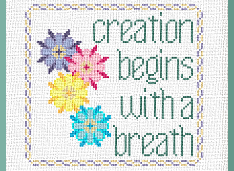 Creations Begins With A Breath. Product image. Four bright, colorful flowers and the title are stitched inside a violet and yellow chain border. A Karma Charm from Grimalkin Crossing.
