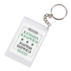 Freebies are good karma: Lesson Learned Karma Burned freebie, finished as a keychain fob. Counted cross stitch PDF design from Grimalkin Crossing.