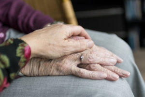 Change is good, and then there's too much of it and suddenly, you're old. In this image, an older someone is reaching out to comfort another person. All that's visible are the hands. Via Grimalkin Crossing.